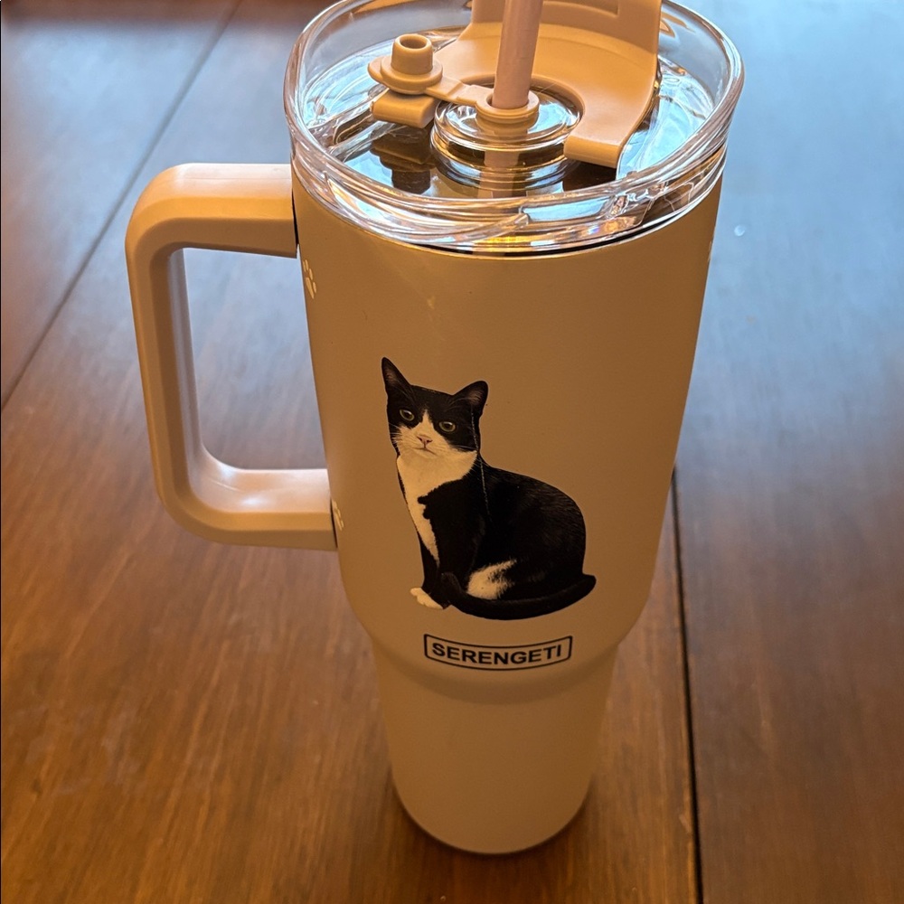 - SERENGETI 40 Oz Ultimate Tumbler with Handle & Straw
